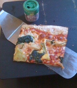The last slice of our spinach & artichoke pizza